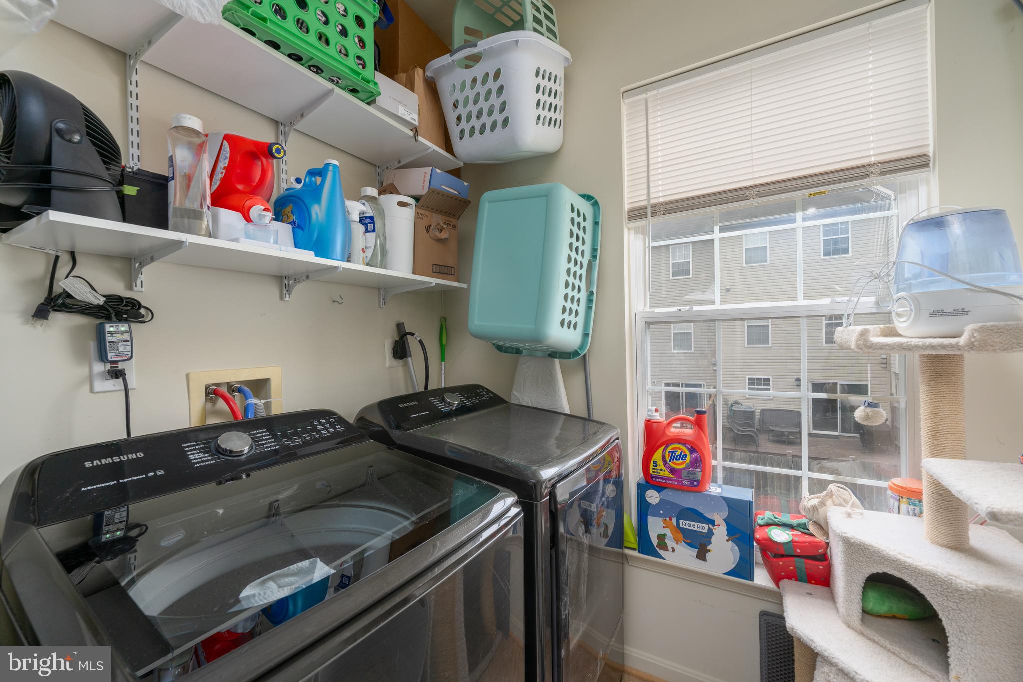 688 Luthardt Road Baltimore, MD 21220 - Photo 27 of 32 a utility room with lots of clutter and cabinets