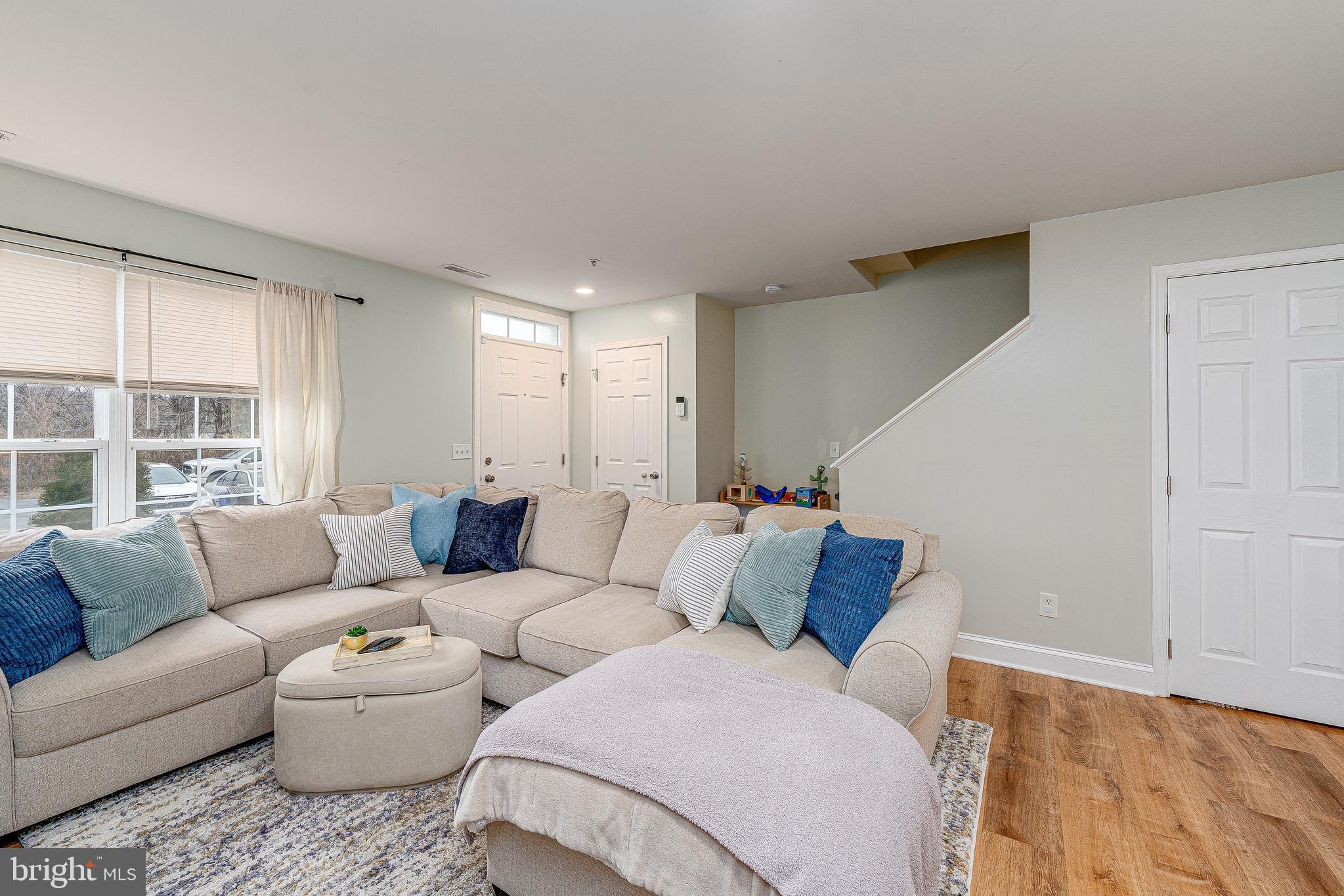688 Luthardt Road Baltimore, MD 21220 - Photo 5 of 32 a living room with furniture and a large window