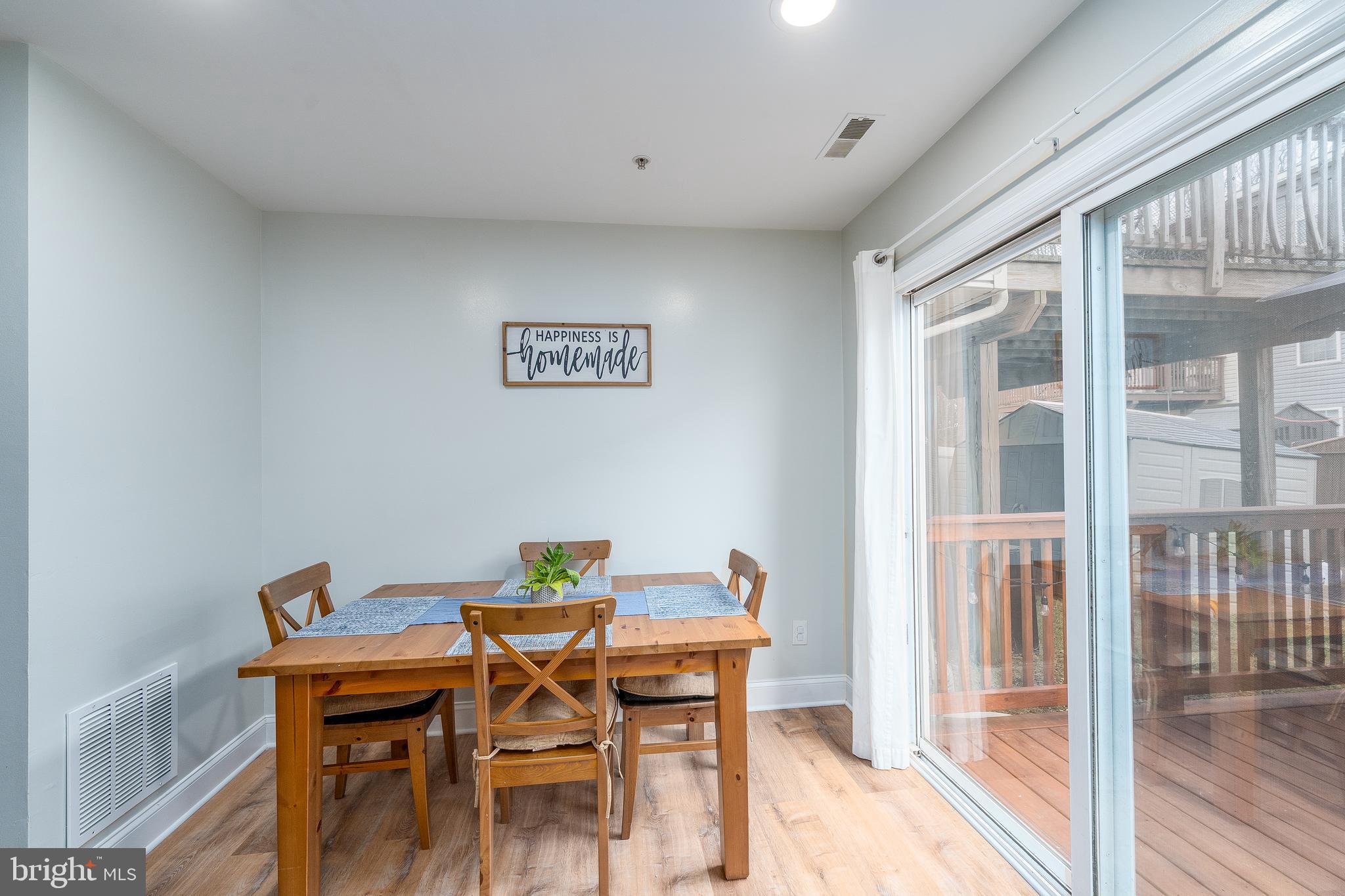 688 Luthardt Road Baltimore, MD 21220 - Photo 9 of 32 a view of a dining room with furniture window and outside view