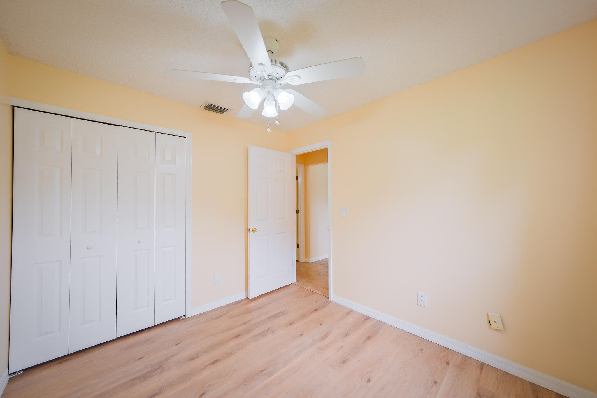 762 Gerlitz Road Southwest Palm Bay, FL 32908 - Photo 16 of 29 a view of an empty room with a fan