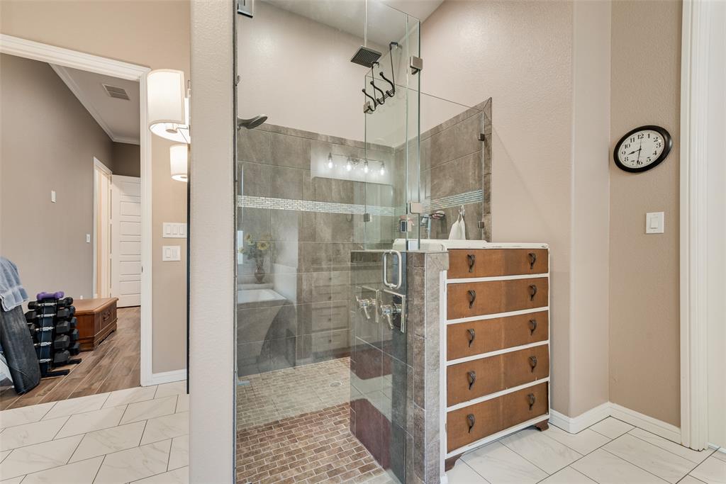 4041 Richard Road Midlothian, TX 76065 - Photo 14 of 36 a bathroom with a shower and a sink