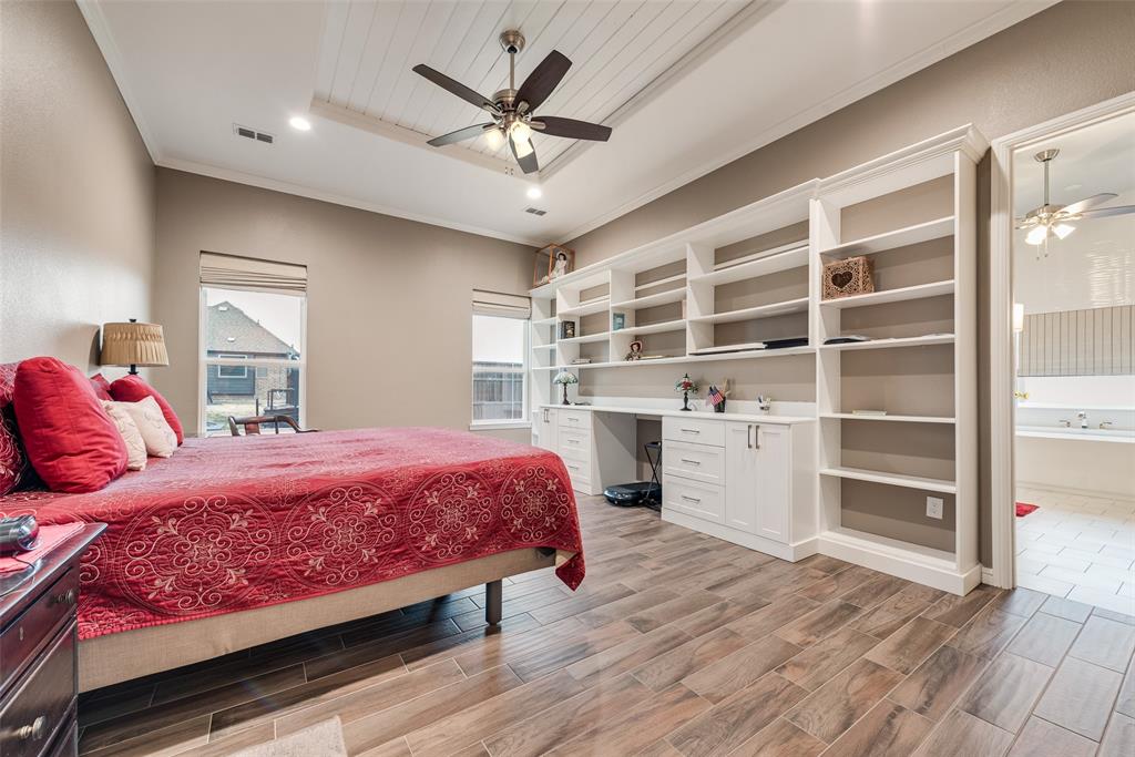 4041 Richard Road Midlothian, TX 76065 - Photo 17 of 36 a bedroom with a bed dresser and a window
