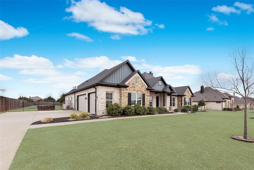 4041 Richard Road Midlothian, TX 76065 - Photo 2 of 36 a front view of house with yard and green space