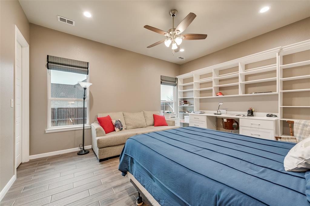 4041 Richard Road Midlothian, TX 76065 - Photo 22 of 36 a living room with furniture and a chandelier