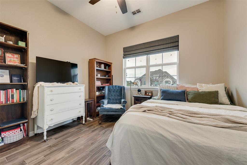 4041 Richard Road Midlothian, TX 76065 - Photo 23 of 36 a bedroom with a bed and furniture