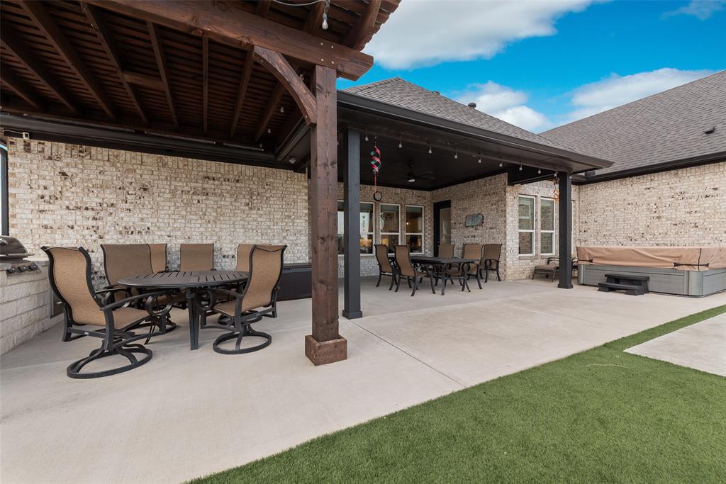 4041 Richard Road Midlothian, TX 76065 - Photo 10 of 36 a view of a patio with table and chairs