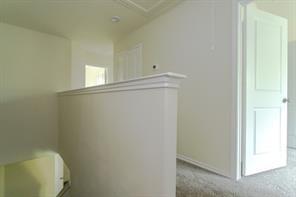 690 Union Street, Unit 2 Bonham, TX 75418 - Photo 8 of 12 a bathroom with a toilet