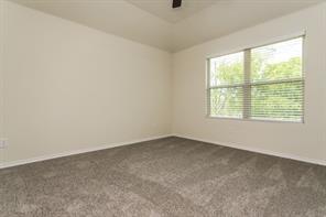 690 Union Street, Unit 2 Bonham, TX 75418 - Photo 10 of 12 an empty room with a window