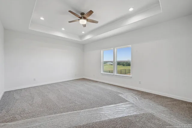 a bathroom with a double vanity sink a mirror and shower
