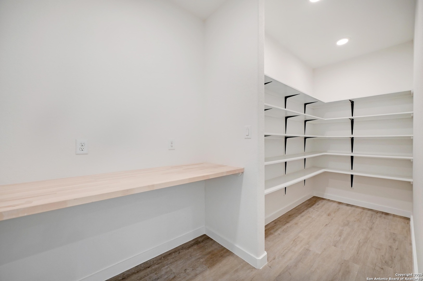 236 Peter Kleid Loop Blanco, TX 78606 - Photo 10 of 21 a view of walk in closet with empty racks