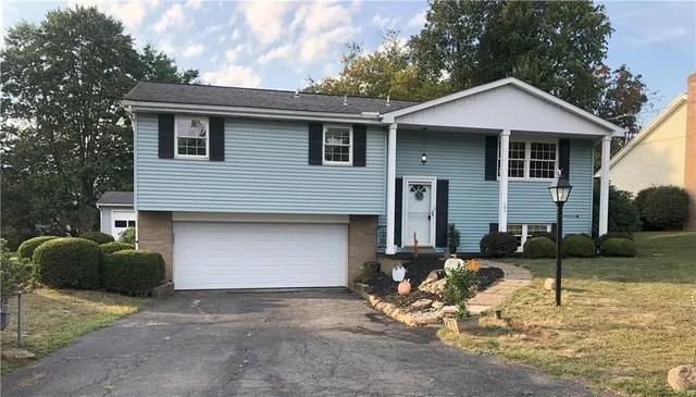a front view of a house with patio