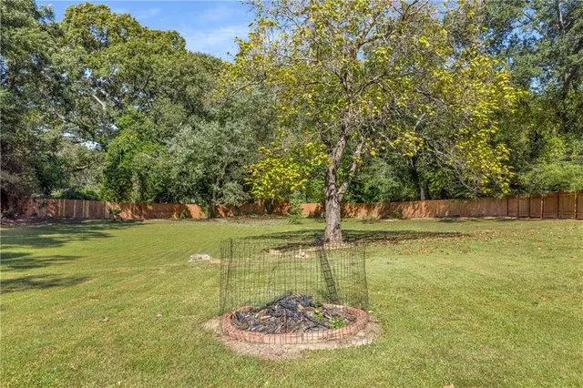 a view of a garden with an outdoor space