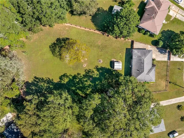 a view of a lake with a building in the background