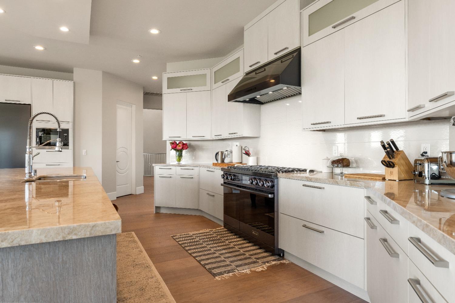 4023 Cornwall Court Rocklin, CA 95677 - Photo 20 of 85 a kitchen with stainless steel appliances granite countertop sink stove and refrigerator