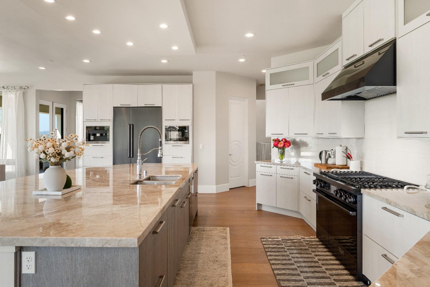 4023 Cornwall Court Rocklin, CA 95677 - Photo 24 of 85 a kitchen with stainless steel appliances granite countertop a sink and a refrigerator