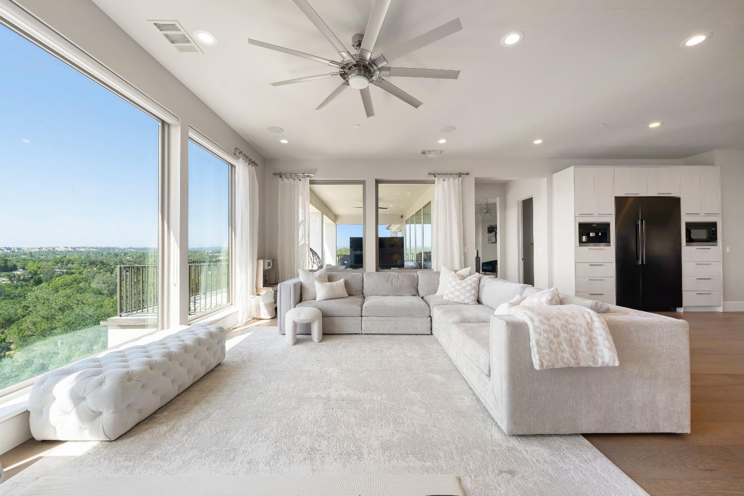 4023 Cornwall Court Rocklin, CA 95677 - Photo 26 of 85 a living room with furniture and large windows
