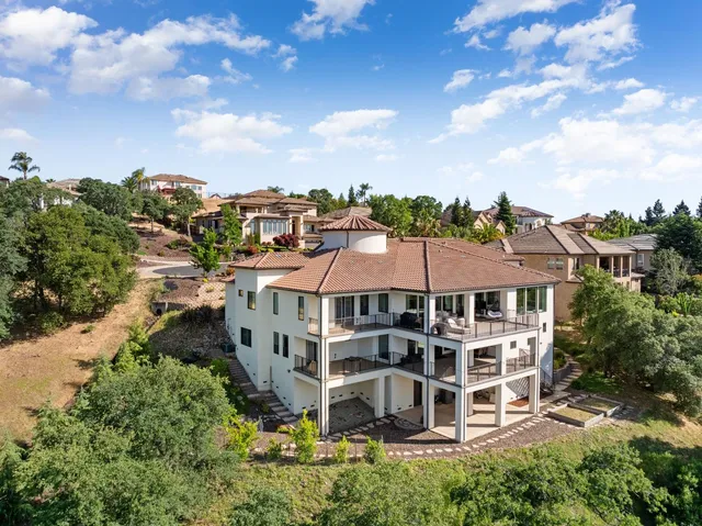 an aerial view of a city with lots of residential buildings