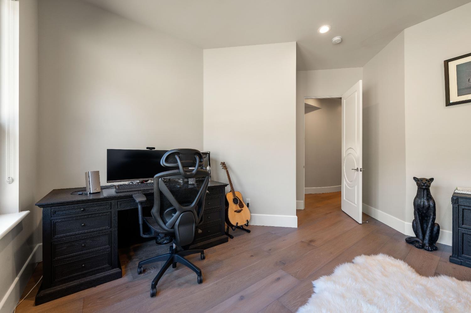 4023 Cornwall Court Rocklin, CA 95677 - Photo 33 of 85 a view of workspace with wooden floor and gym equipment
