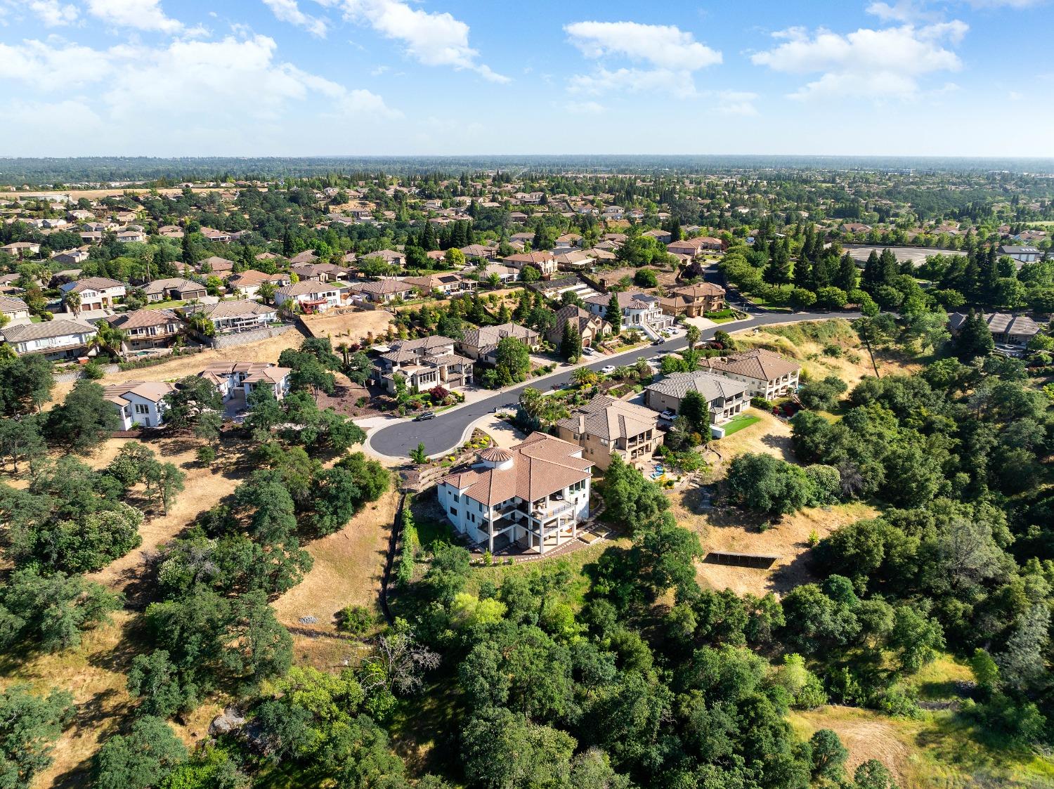 4023 Cornwall Court Rocklin, CA 95677 - Photo 5 of 85 an aerial view of a city with lots of residential buildings