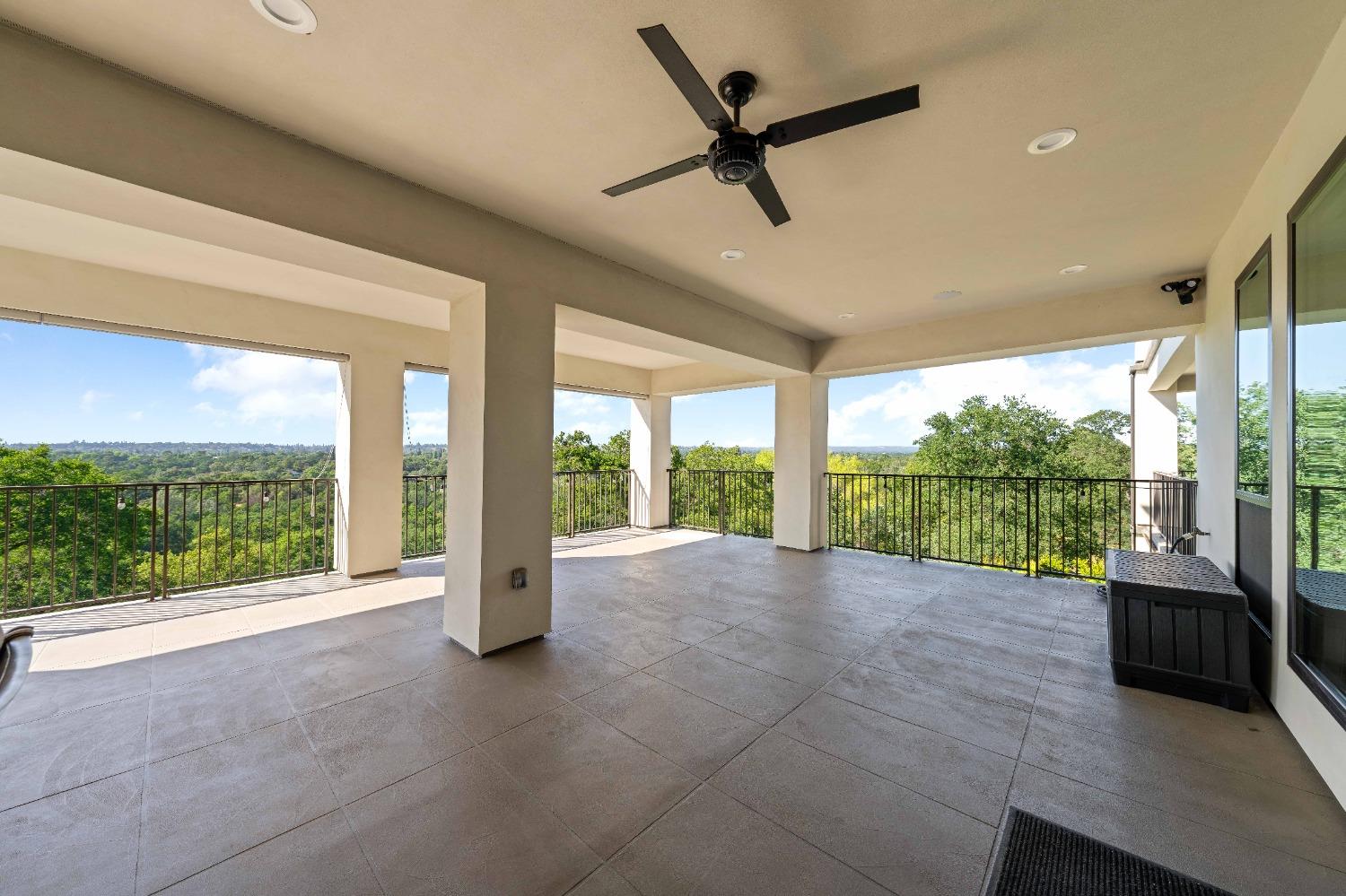 4023 Cornwall Court Rocklin, CA 95677 - Photo 74 of 85 a view of an empty room with a floor to ceiling window and an outdoor view