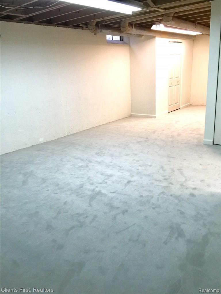 1875 Allenway Court Rochester, MI 48309 - Photo 24 of 27 partially finished basement with newer carpeting