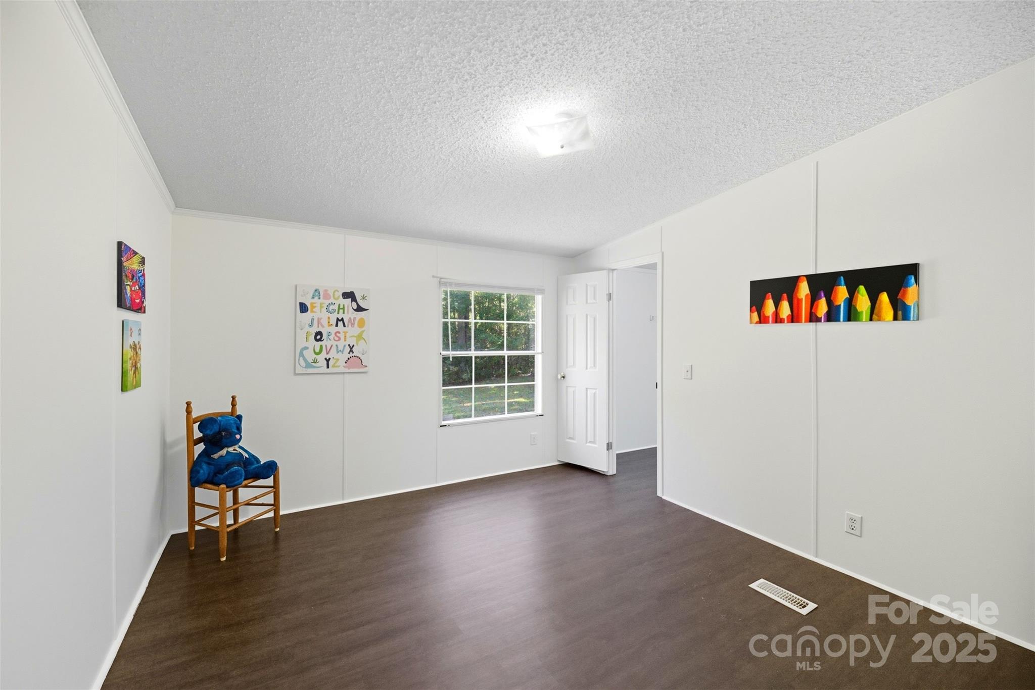 2319 Alexis Lucia Road Stanley, NC 28164 - Photo 15 of 32 a view of an empty room with a window
