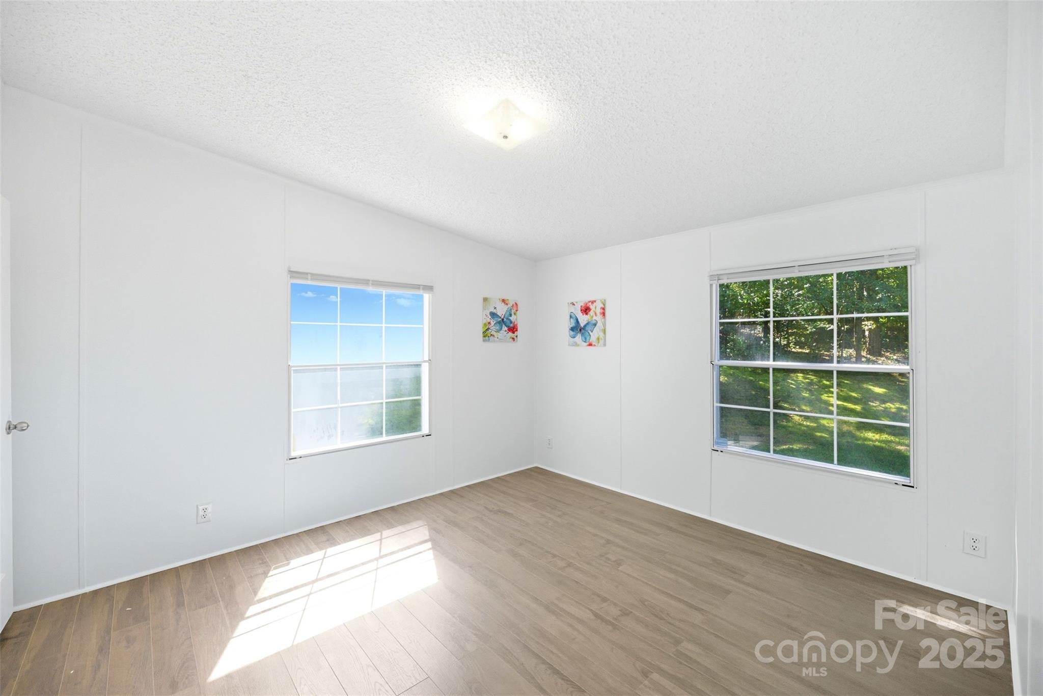 2319 Alexis Lucia Road Stanley, NC 28164 - Photo 20 of 32 an empty room with windows