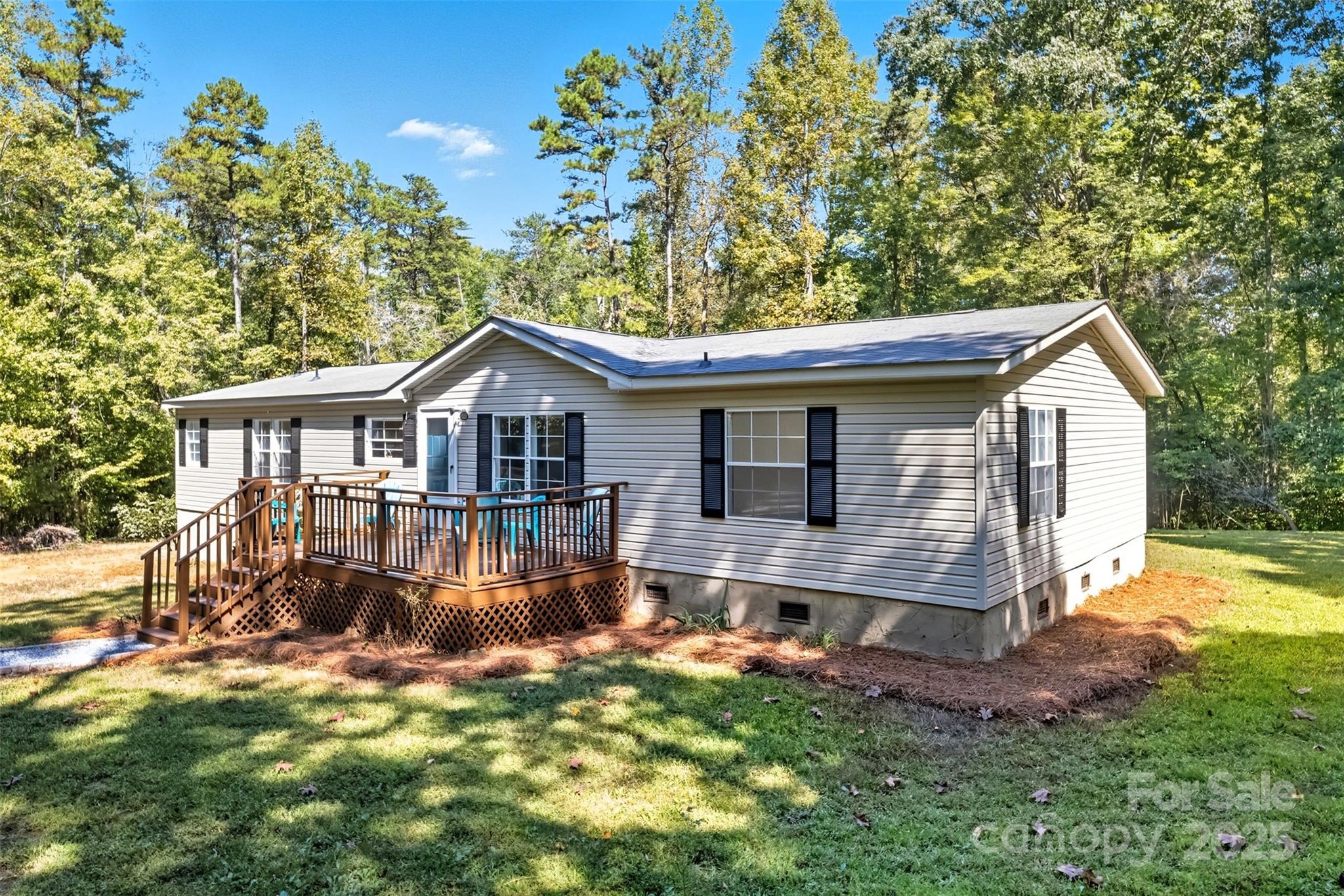 2319 Alexis Lucia Road Stanley, NC 28164 - Photo 2 of 32 a front view of house with yard and green space