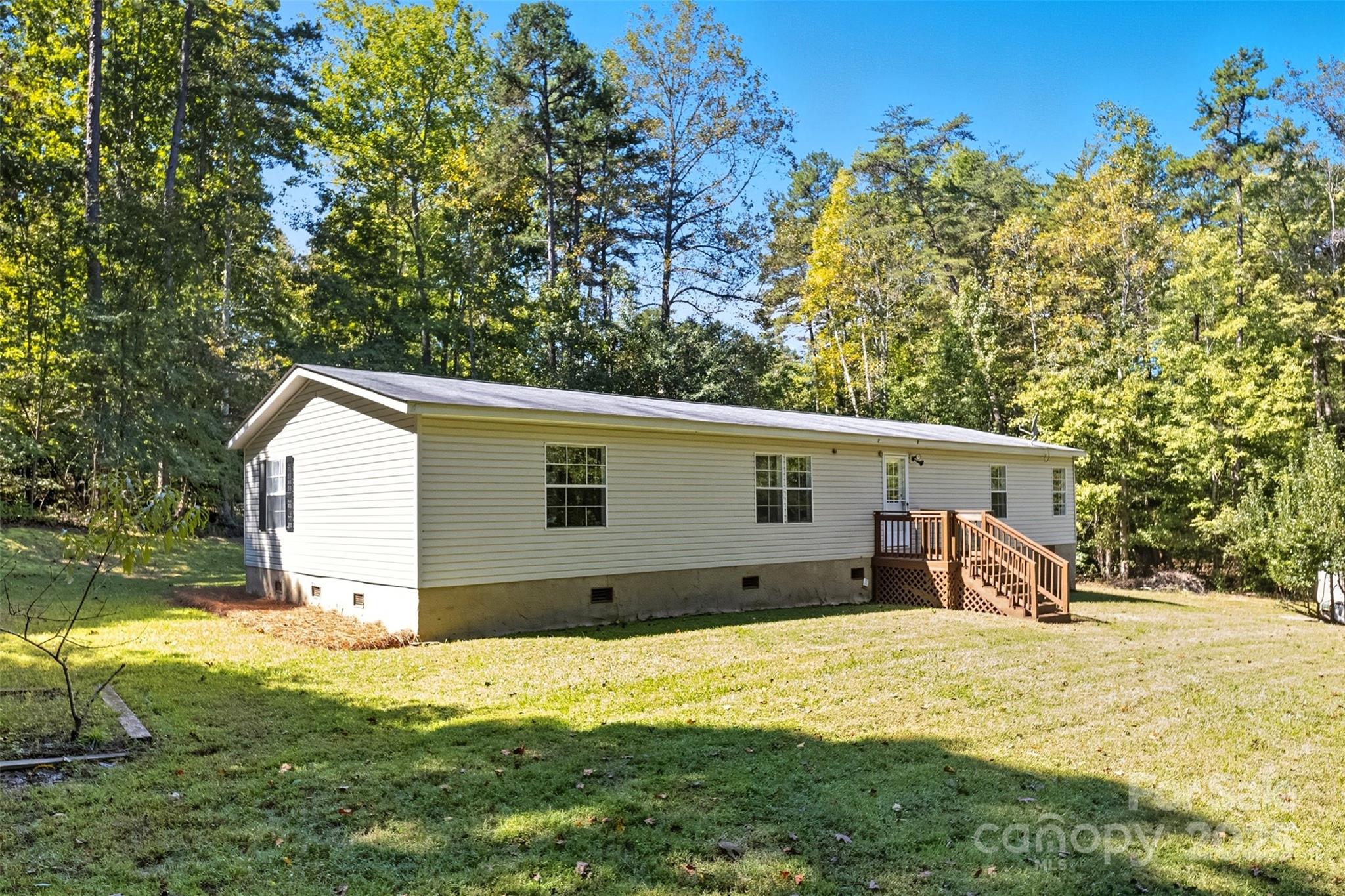 2319 Alexis Lucia Road Stanley, NC 28164 - Photo 25 of 32 a view of a backyard