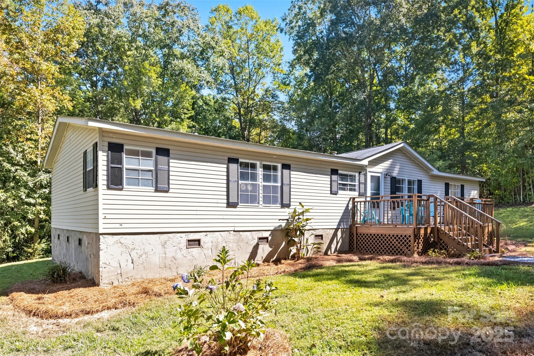 2319 Alexis Lucia Road Stanley, NC 28164 - Photo 3 of 32 a view of a house with a yard chairs and couches