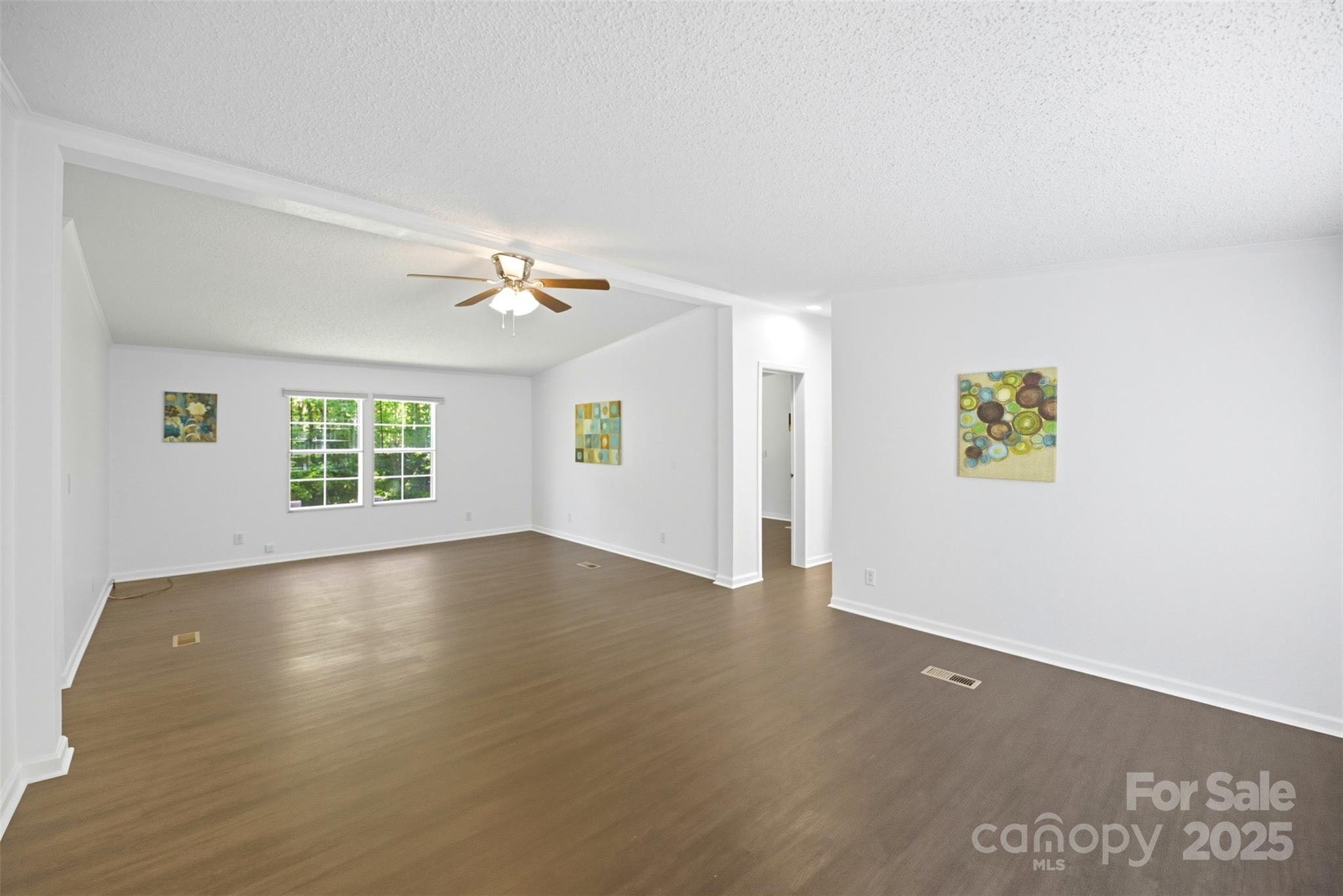 2319 Alexis Lucia Road Stanley, NC 28164 - Photo 4 of 32 a view of an empty room with a window