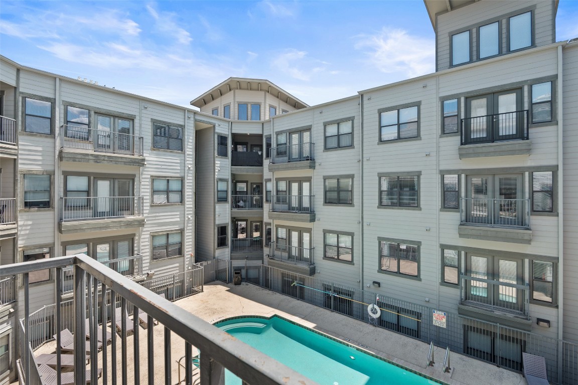 2502 Leon Street, Unit 417 Austin, TX 78705 - Photo 21 of 30 a front view of a building with large windows
