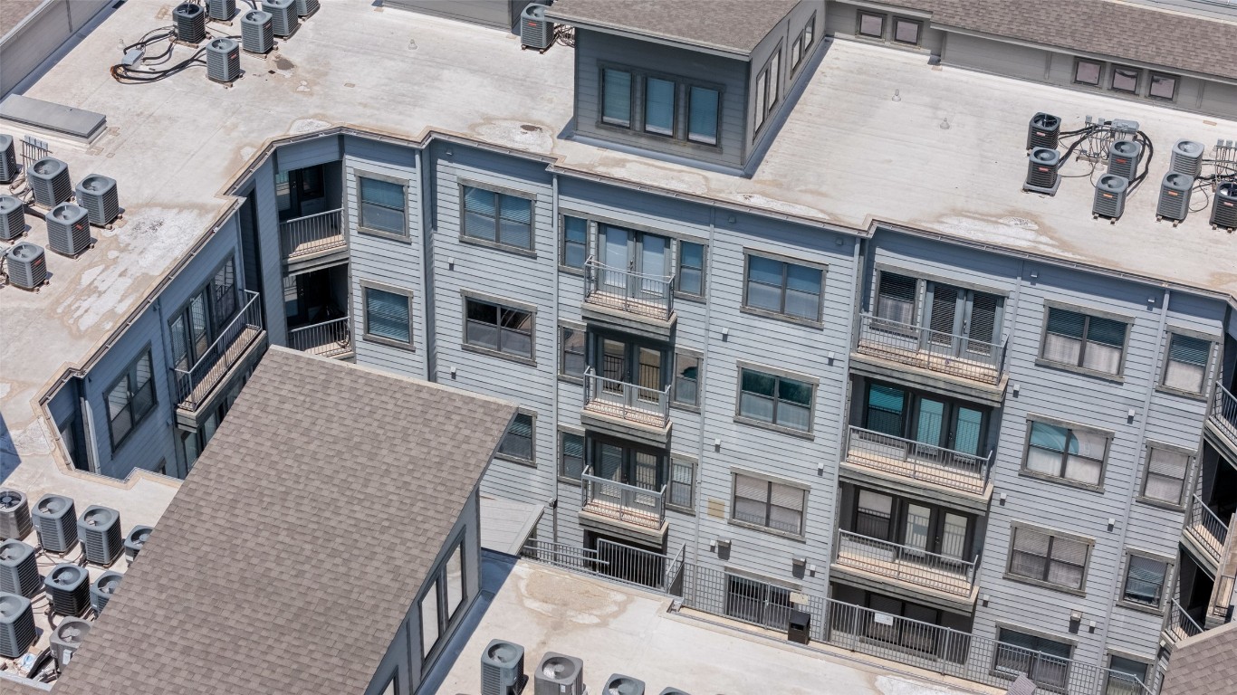 2502 Leon Street, Unit 417 Austin, TX 78705 - Photo 23 of 30 a front view of a building with many windows