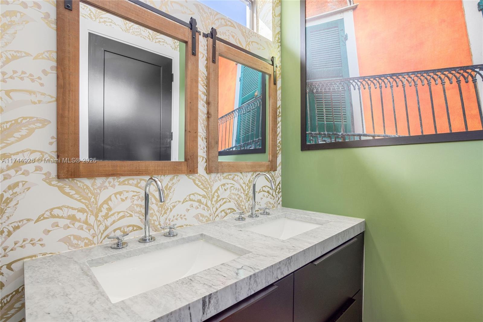 416 Northwest 52nd Street Miami, FL 33127 - Photo 12 of 70 a bathroom with a granite countertop sink and a mirror