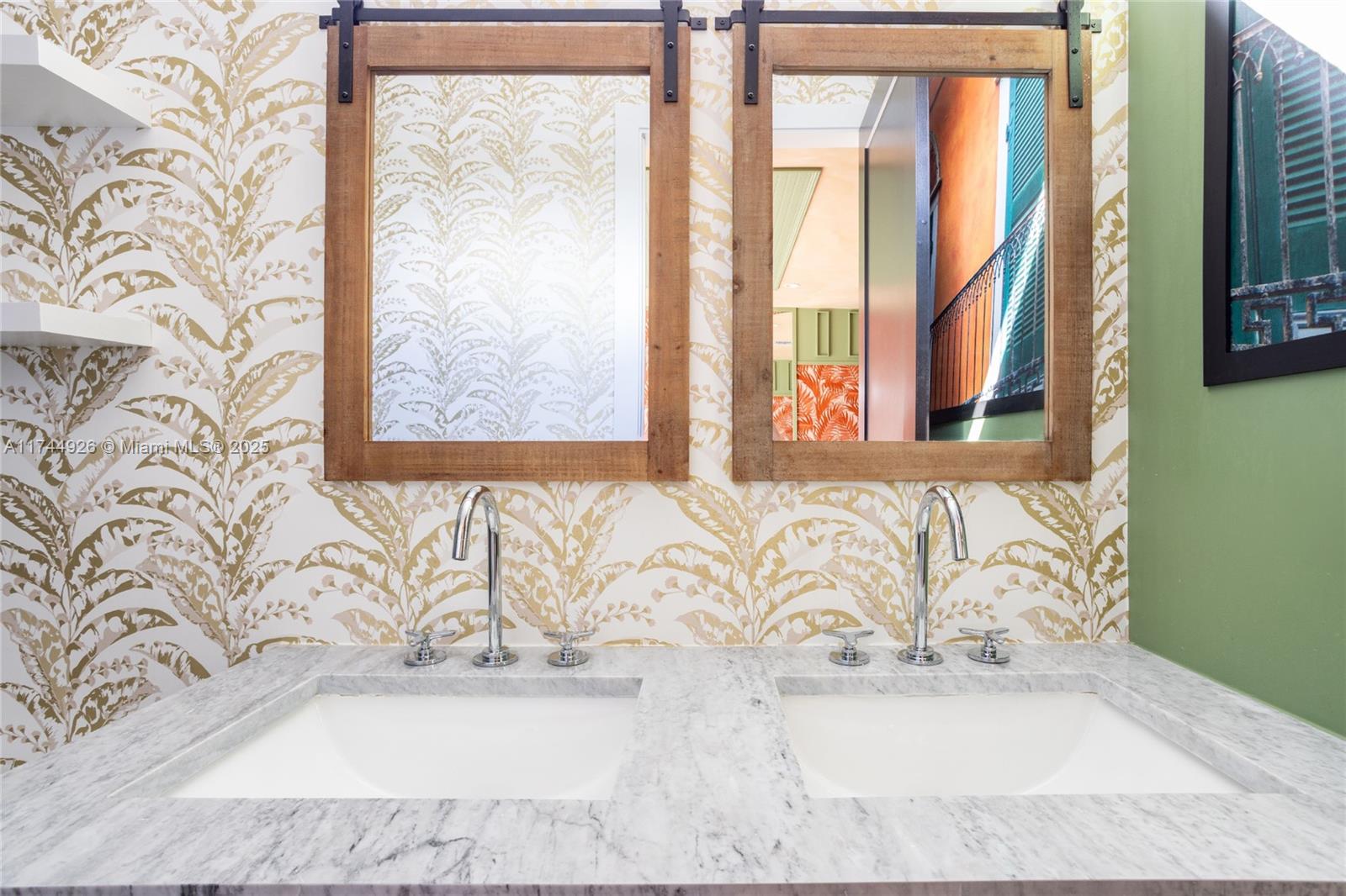 416 Northwest 52nd Street Miami, FL 33127 - Photo 13 of 70 a white bath tub sitting in a bathroom next to a window