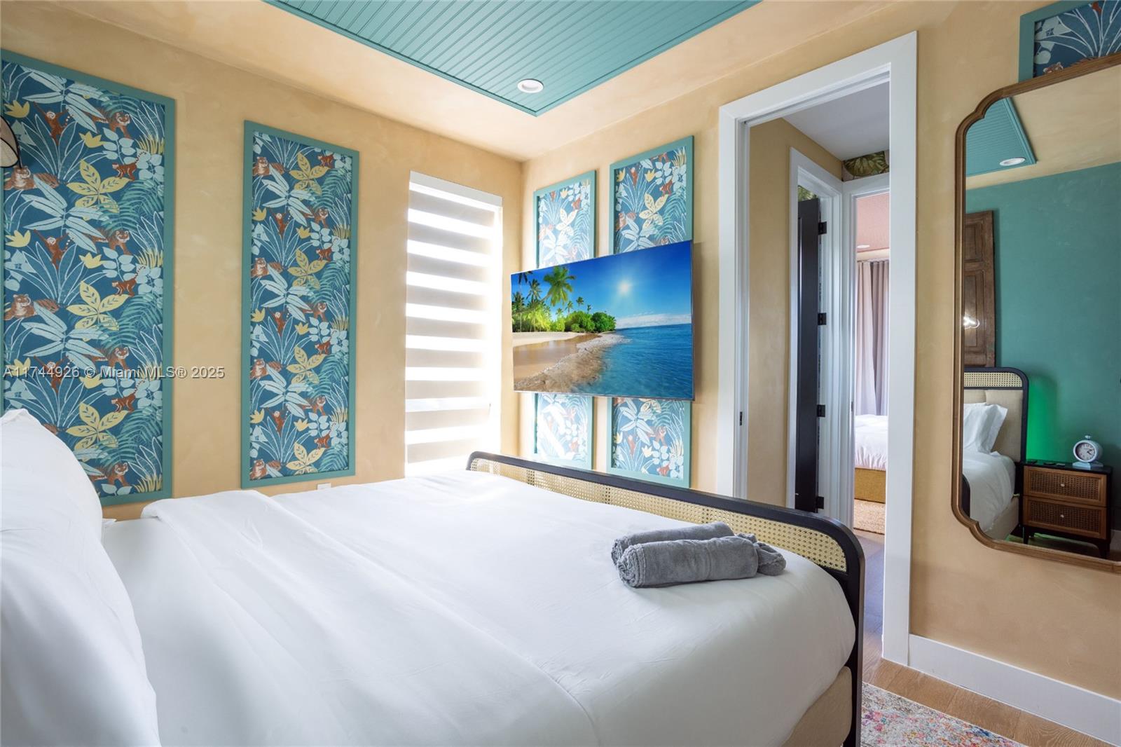 416 Northwest 52nd Street Miami, FL 33127 - Photo 16 of 70 a bedroom with a bed and a window