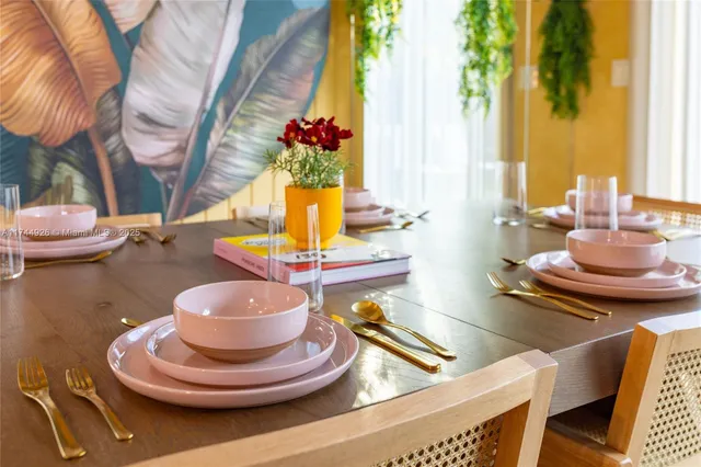 a view of a dining room with furniture