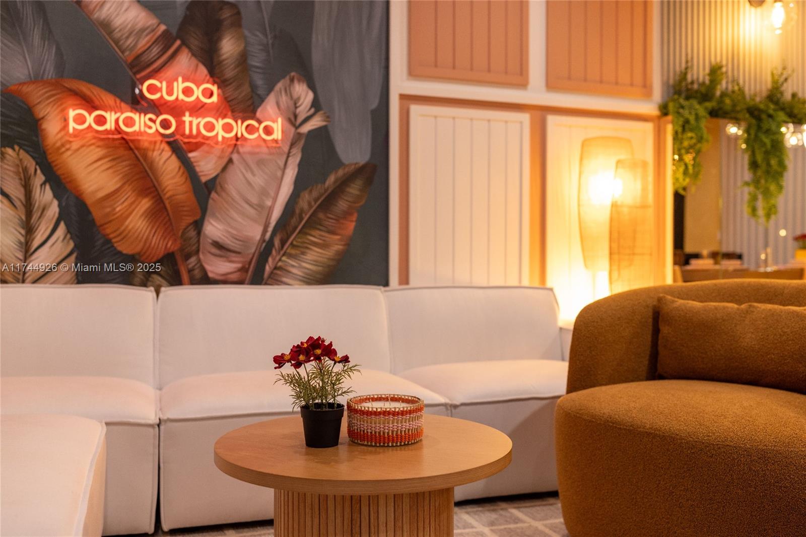 416 Northwest 52nd Street Miami, FL 33127 - Photo 49 of 70 a dining room with furniture and a potted plant