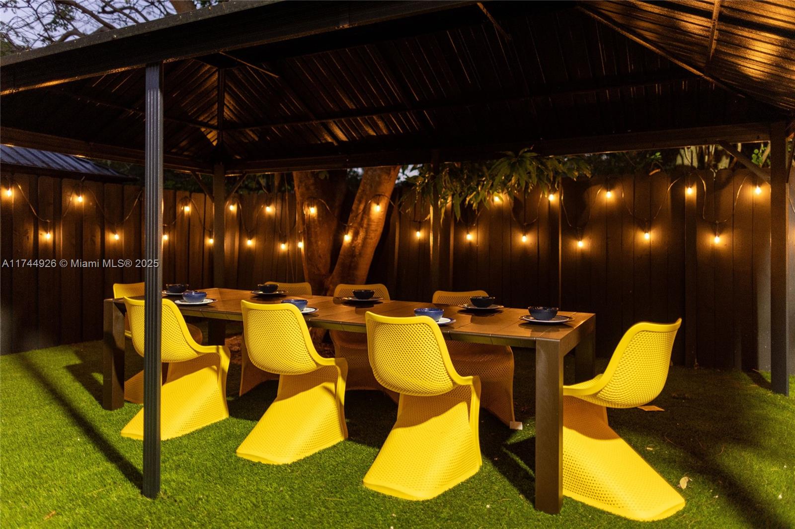 416 Northwest 52nd Street Miami, FL 33127 - Photo 52 of 70 a view of an chairs and tables in the patio