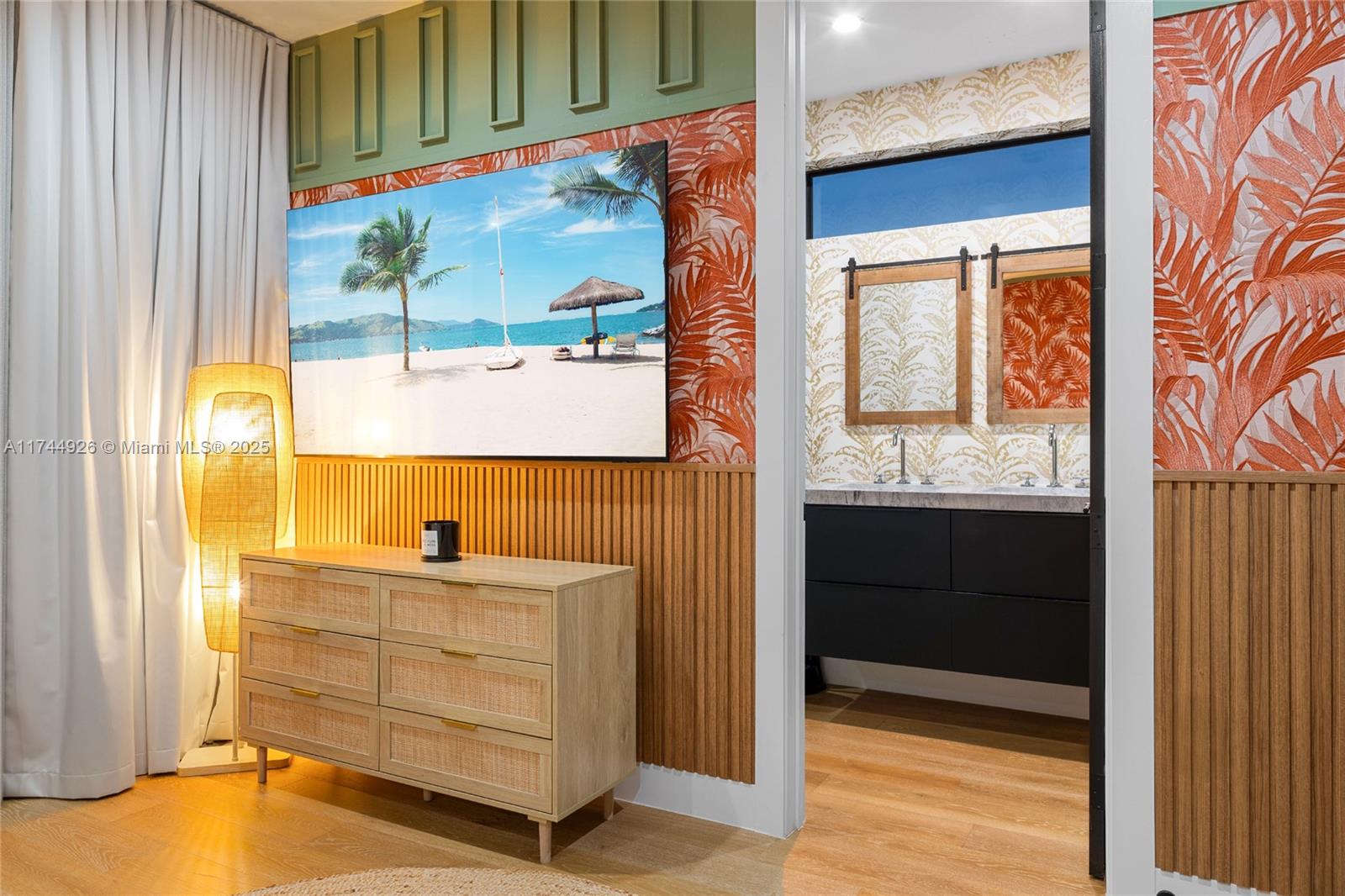 416 Northwest 52nd Street Miami, FL 33127 - Photo 54 of 70 a view of walk in closet and bedroom