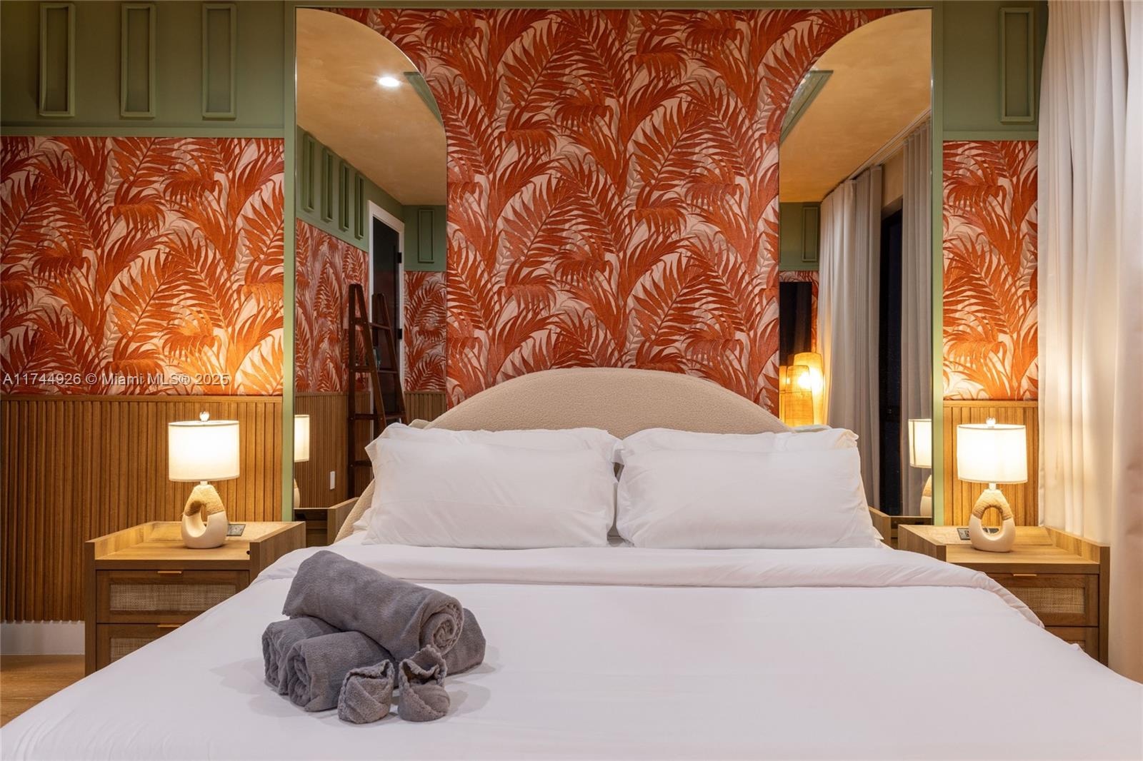 416 Northwest 52nd Street Miami, FL 33127 - Photo 55 of 70 a bedroom with a large bed and a large window