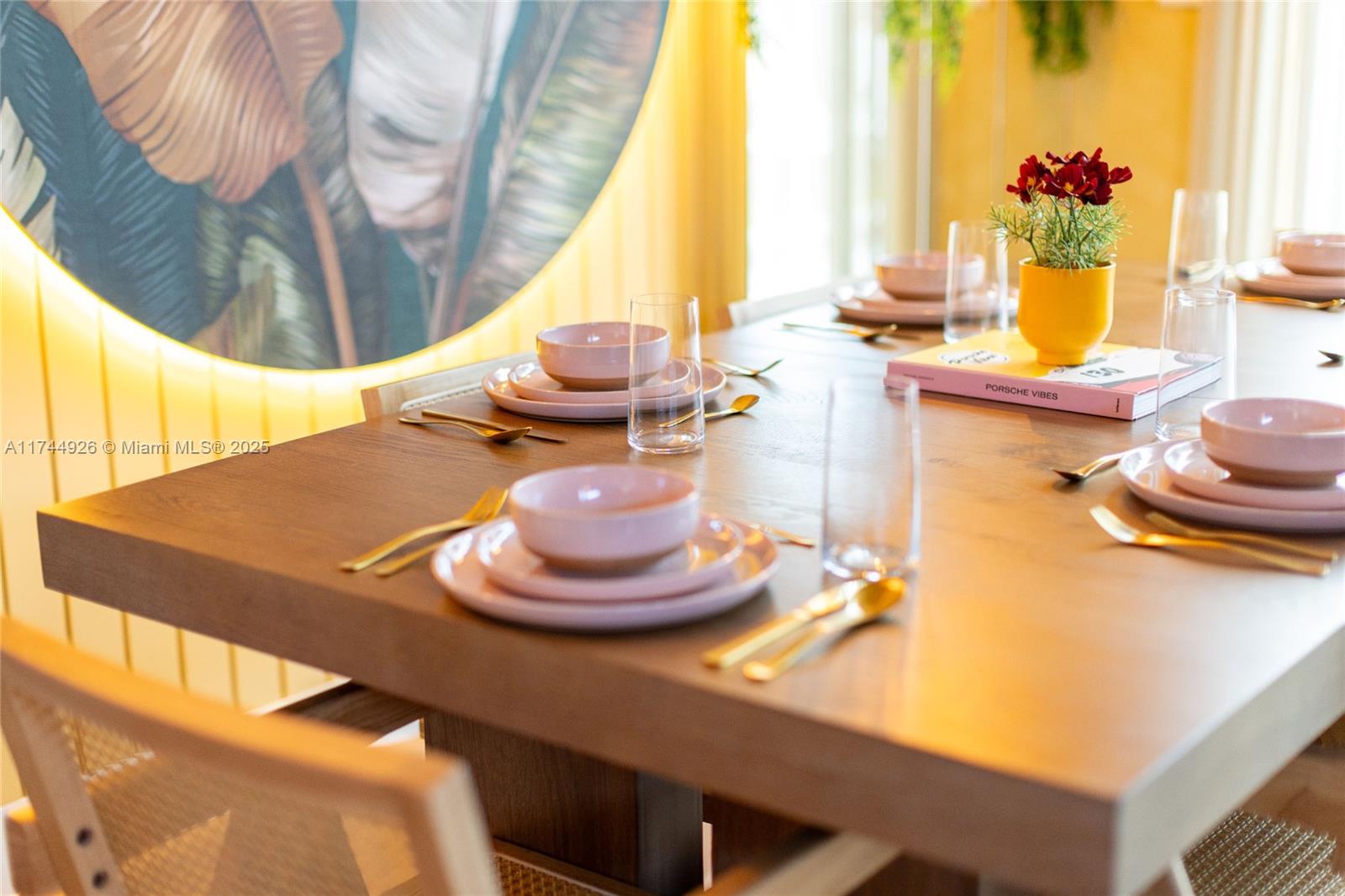 416 Northwest 52nd Street Miami, FL 33127 - Photo 63 of 70 a room with a table and chairs in it