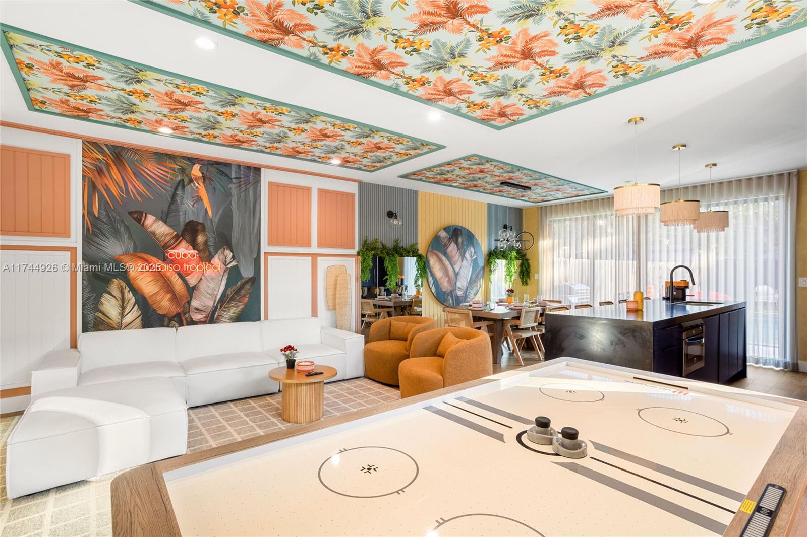 416 Northwest 52nd Street Miami, FL 33127 - Photo 8 of 70 a living room with furniture and a large window