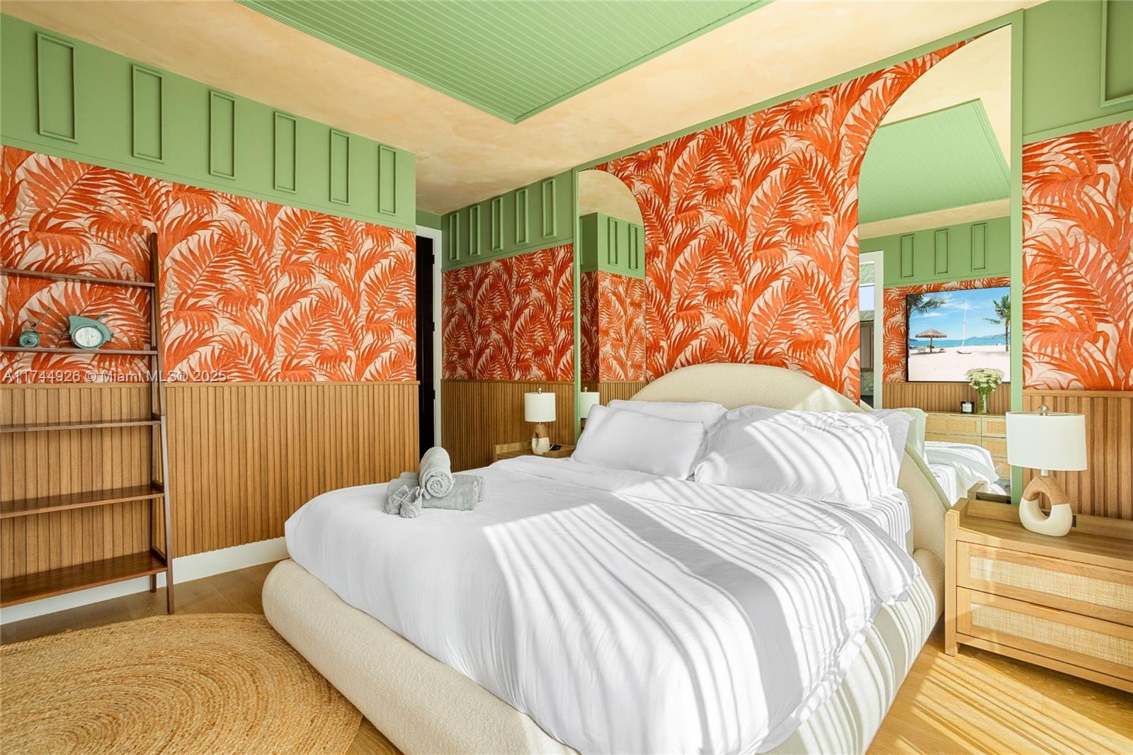 416 Northwest 52nd Street Miami, FL 33127 - Photo 9 of 70 a bedroom with a bed and a painting on the wall