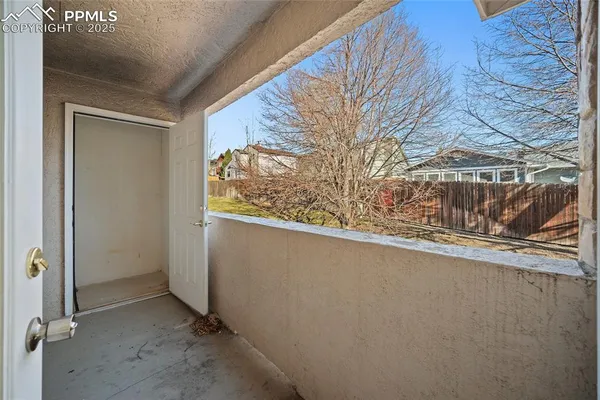 a view of a house with a snow in the yard