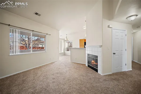 a view of kitchen and workspace