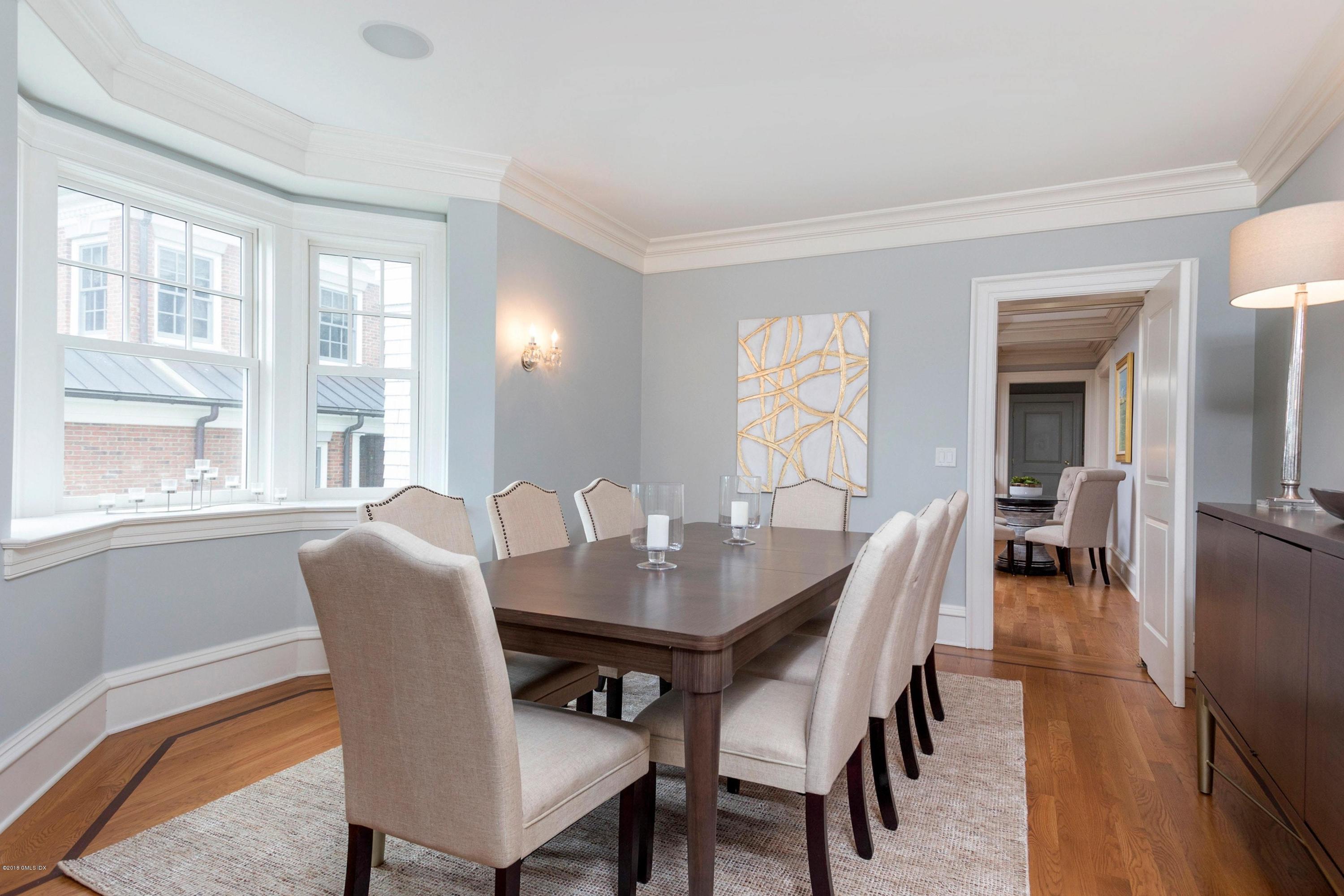 58 Ridge Street Greenwich, CT 06830 - Photo 11 of 29 a view of a dining room with furniture and wooden floor