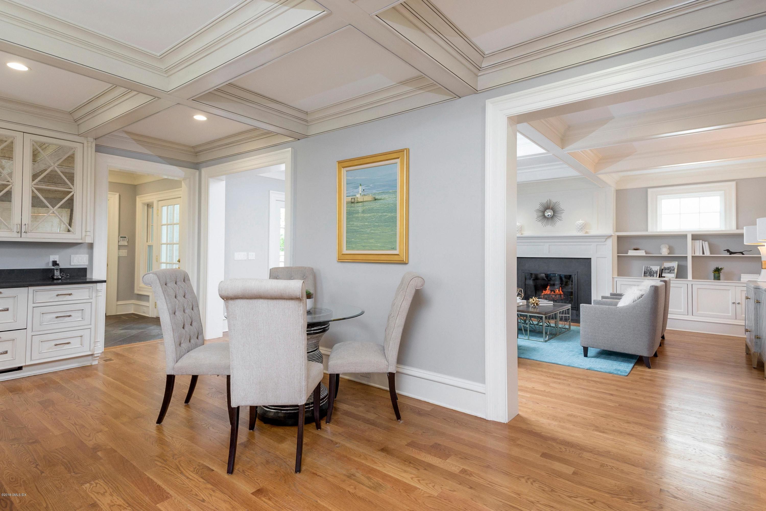 58 Ridge Street Greenwich, CT 06830 - Photo 15 of 29 a view of a dining room with furniture window and wooden floor