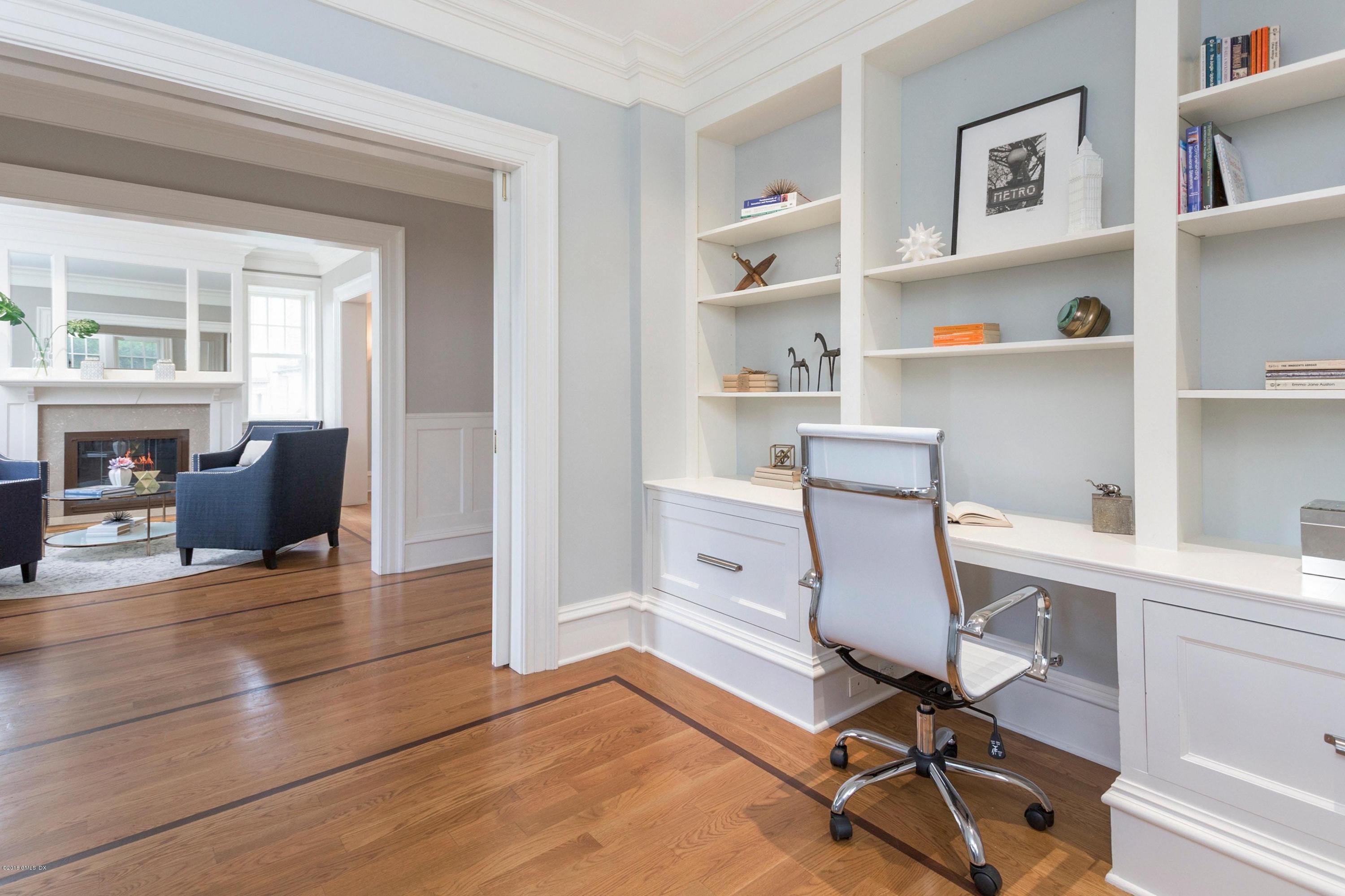 58 Ridge Street Greenwich, CT 06830 - Photo 16 of 29 a view of a workspace with furniture and a window
