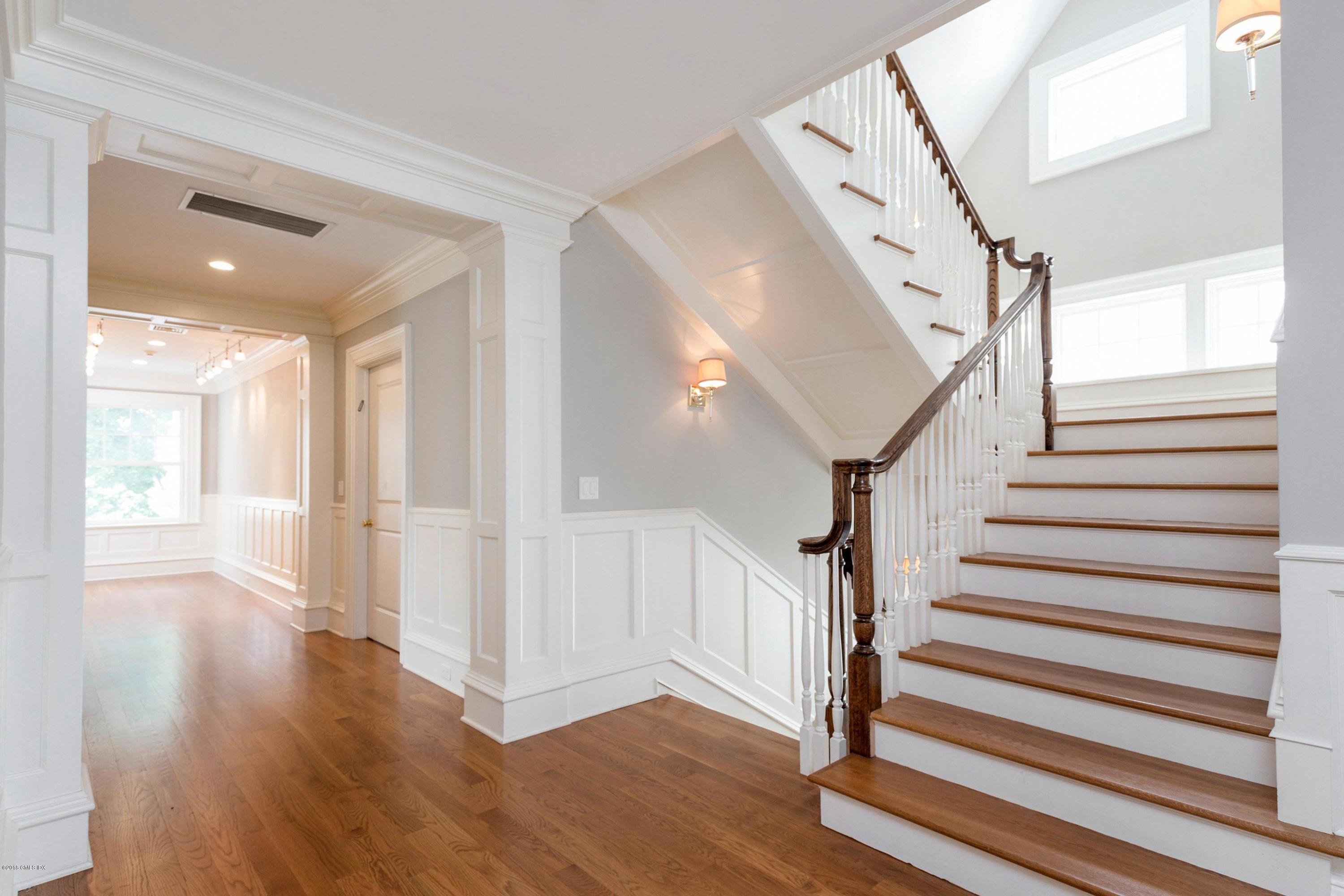 58 Ridge Street Greenwich, CT 06830 - Photo 17 of 29 a view of entryway and hall with wooden floor